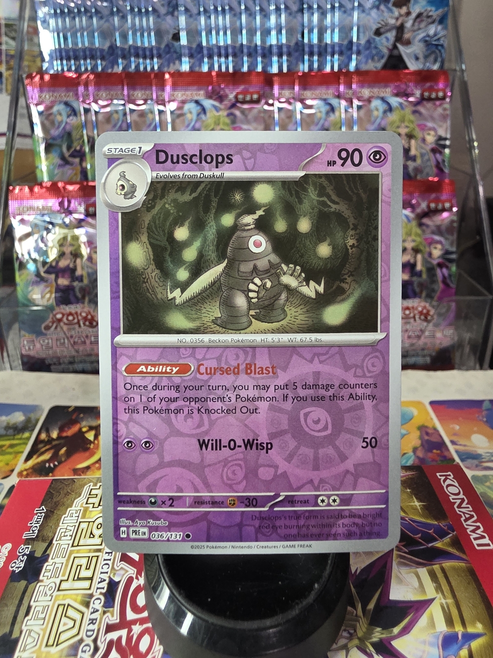 Dusclops Pokémon TCG Card - Purple Holo
